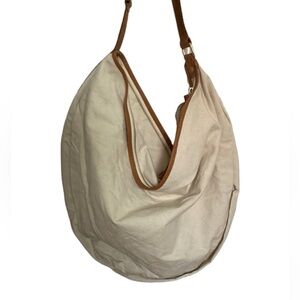 Tan and brown Urban outfitters half circle bag